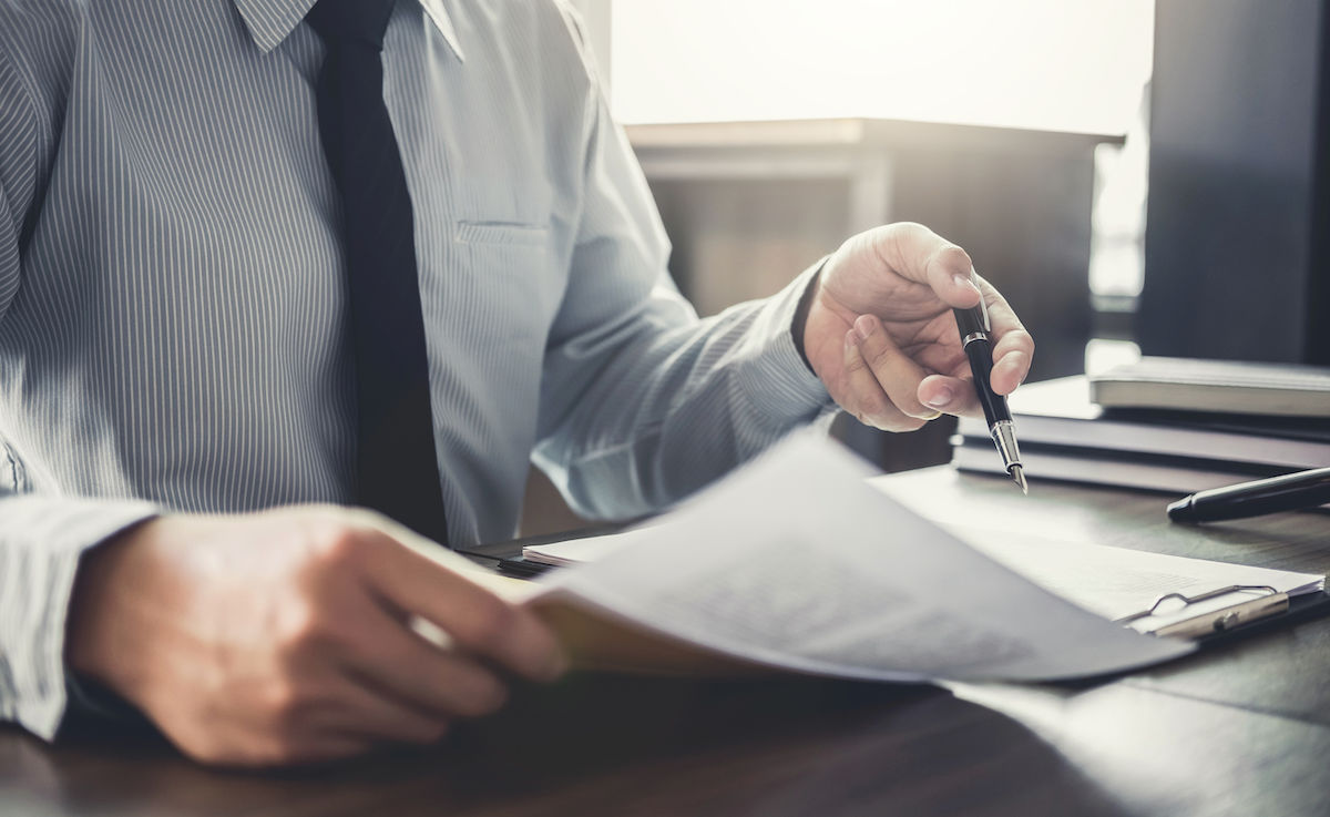 Lawyer reviewing paperwork